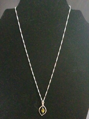 #ad Silver Rhodium Necklace W L.Green Stone $5.00