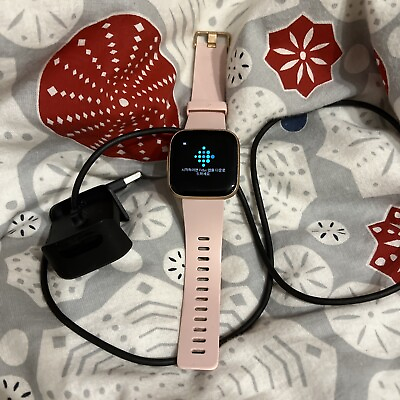 #ad Used Fitbit Versa 2 Health Fitness Smartwatch Petal Copper Rose Cradle Charger $30.00